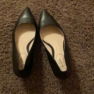 These heels are an inch and a half. They are pointed and cushioned bottoms.